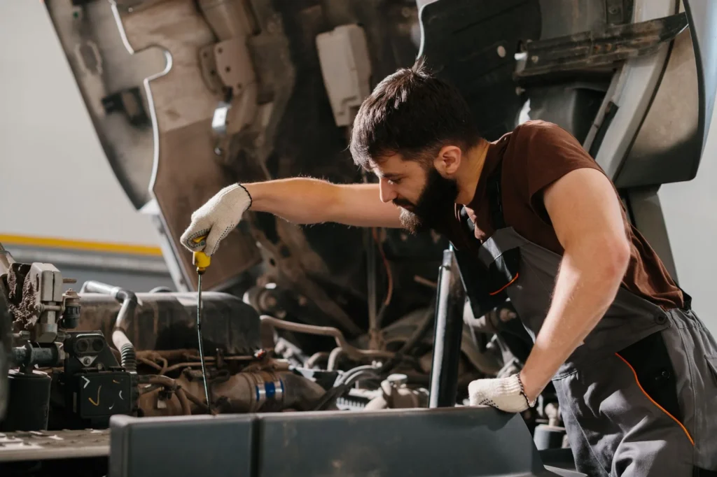 Heavy-duty truck being assessed inside a Calgary repair shop