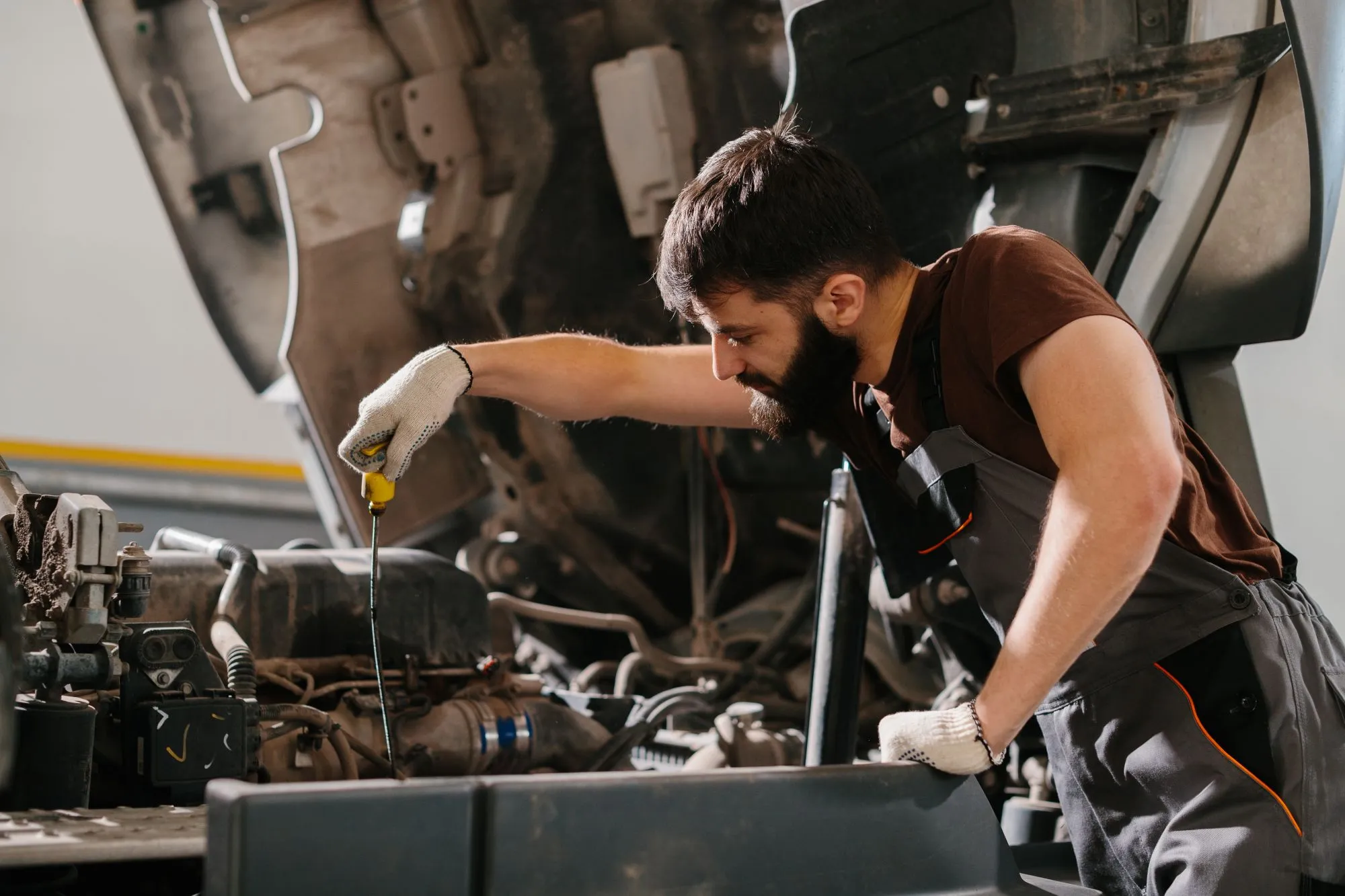 Heavy-duty truck being assessed inside a Calgary repair shop